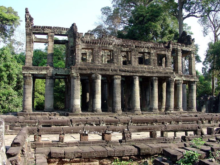 The round-columned two-storey pavilion standing among Preah Khan's forest ruins.